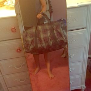 Large green and purple travel bag